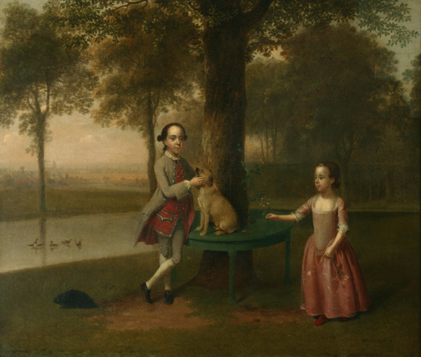 Two Children and a Dog in a Park