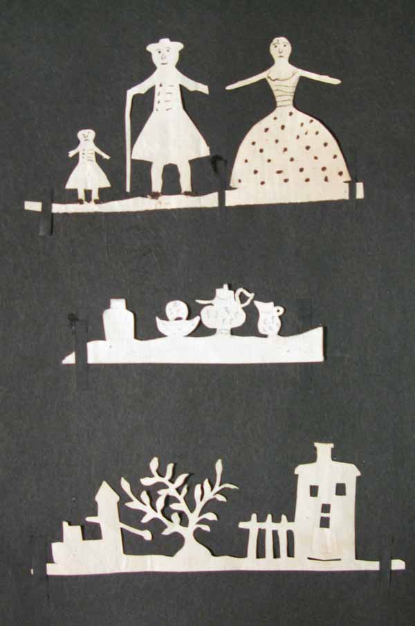 Cut Out Paper Silhouettes of a Family, Tea Service and a House.