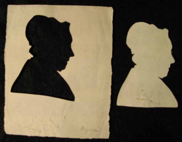 A White Paper Cut Out Silhouette Portrait of a Woman