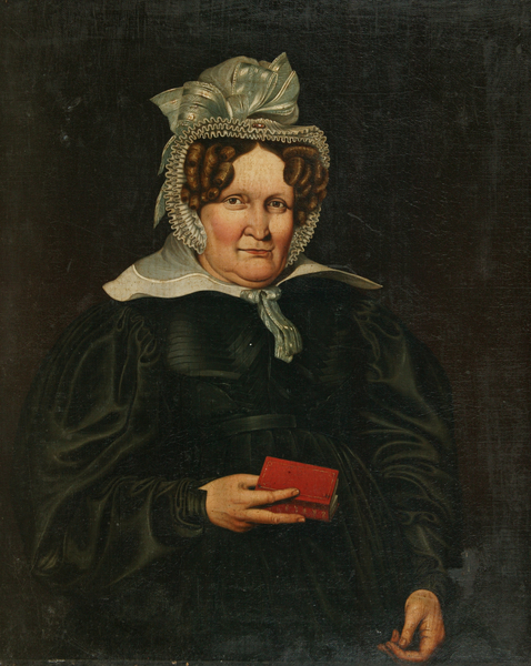 A Woman Holding a Red Book